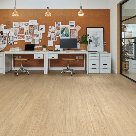 River Hickory rigid core floors in an office; from the Korlok Reserve collection