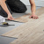Contractor installing Palmaria LLP149 loose lay floors