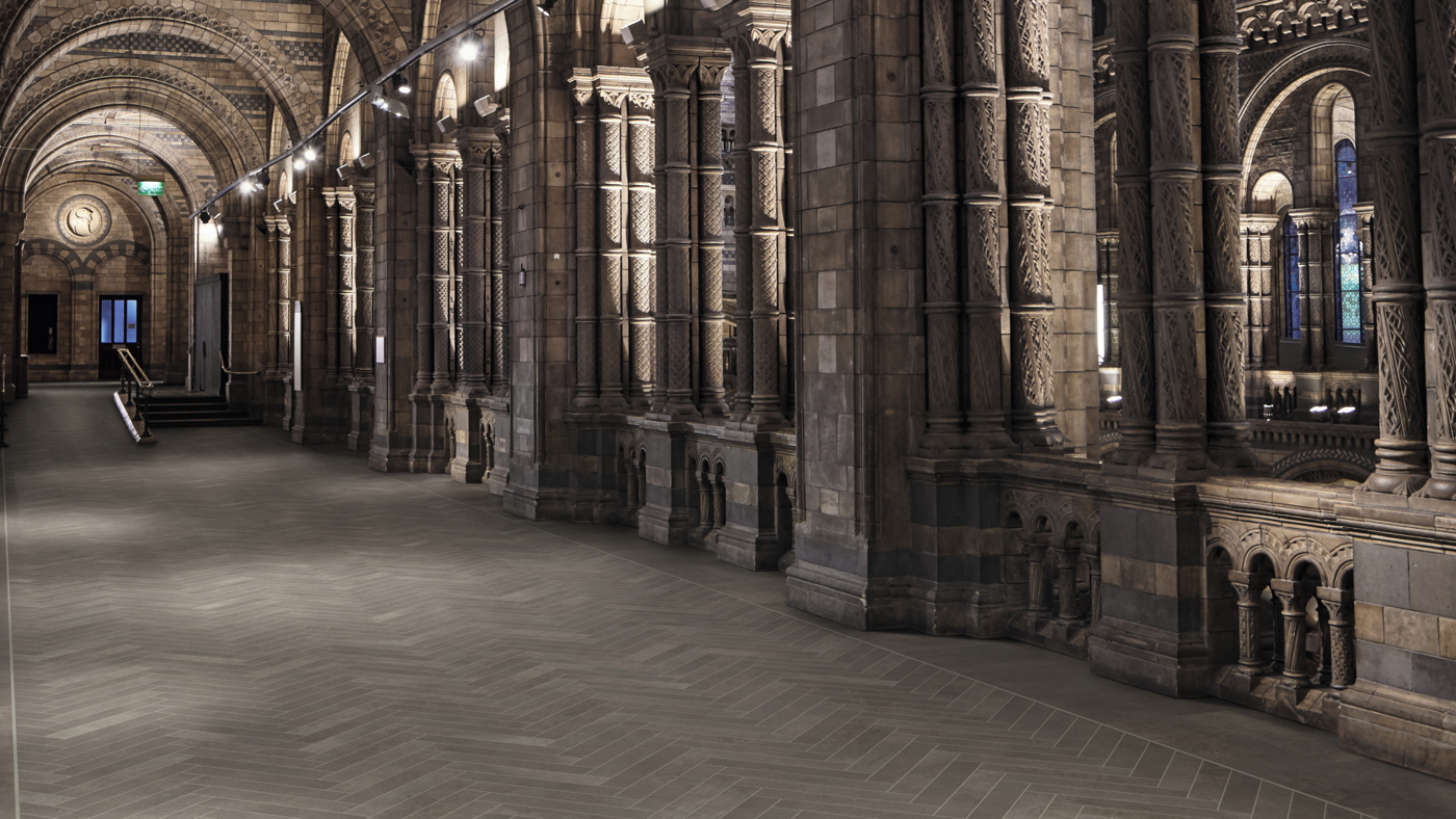 Fumo SM-SP216 and design strips DS12-3 herringbone floors in an architectural hallway