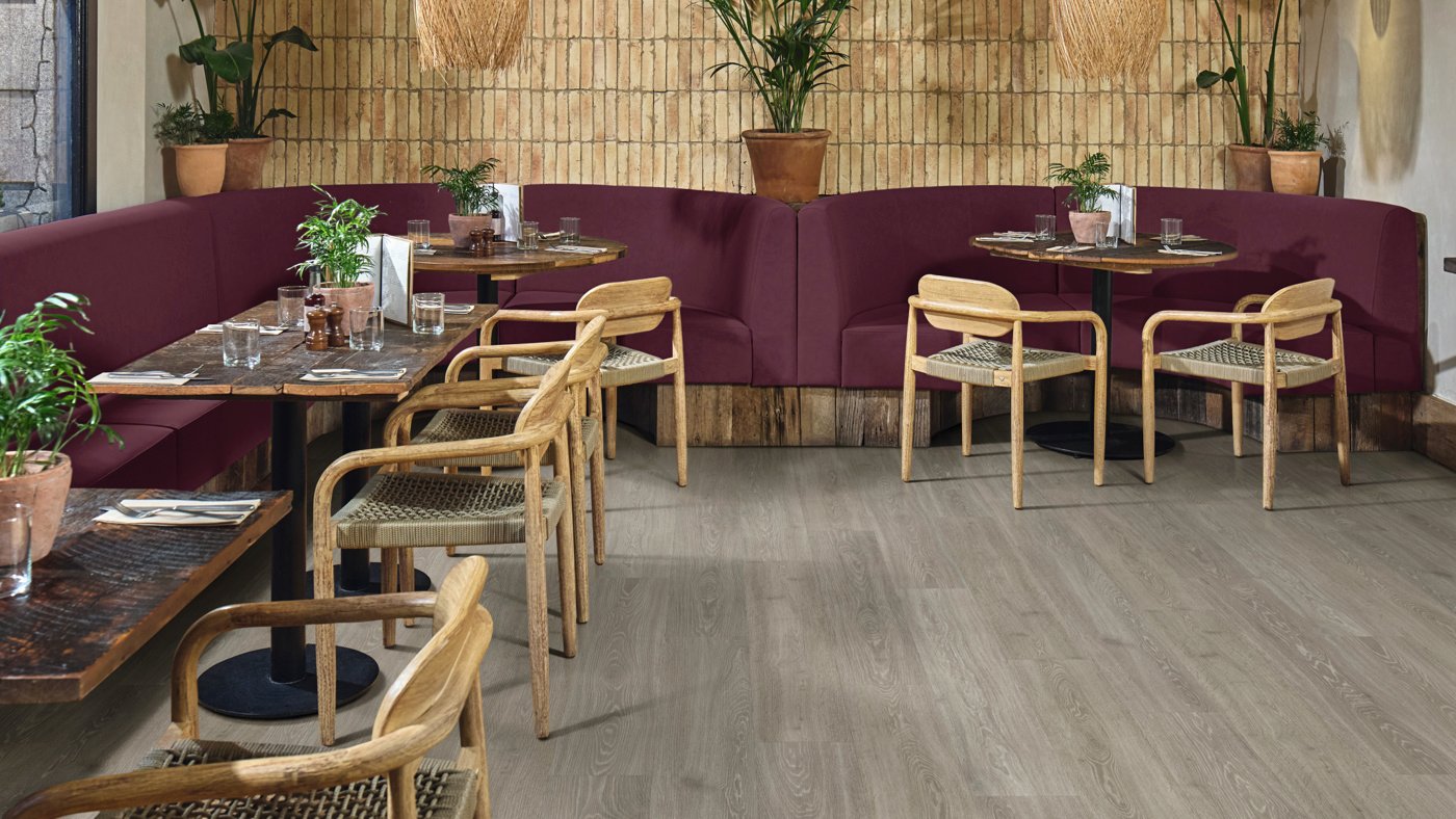 Boho restaurant flooring uses Grey Loire Oak lvp to elevate the space