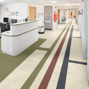 Opus gluedown abstract color lvt floors help direct people where to go in a hospital; featuring Toledo SP811, Burnt Sienna SP719, Indigo SP720 and Olive SP740