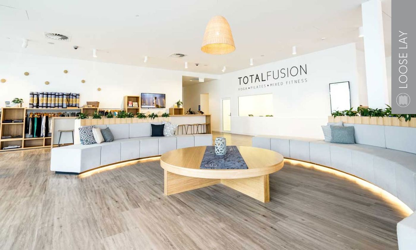  Karndean’s neutral oak look flooring in gym and fitness studios