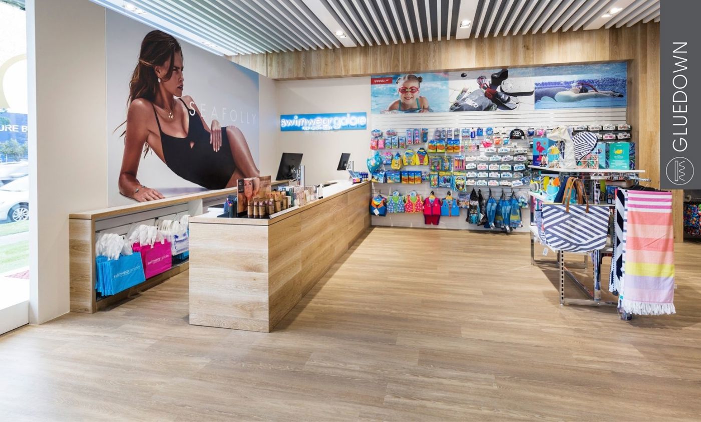 Van Gogh gluedown vinyl flooring in commercial retail spaces