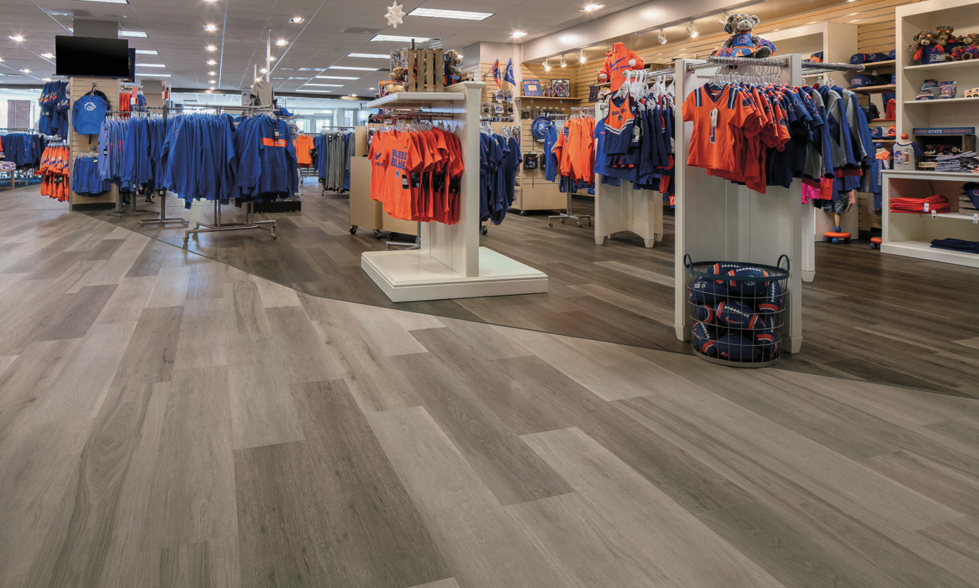 Washed Velvet Ash and Washed Grey Ash lvt floors in the Bronco Shop at Boise State University