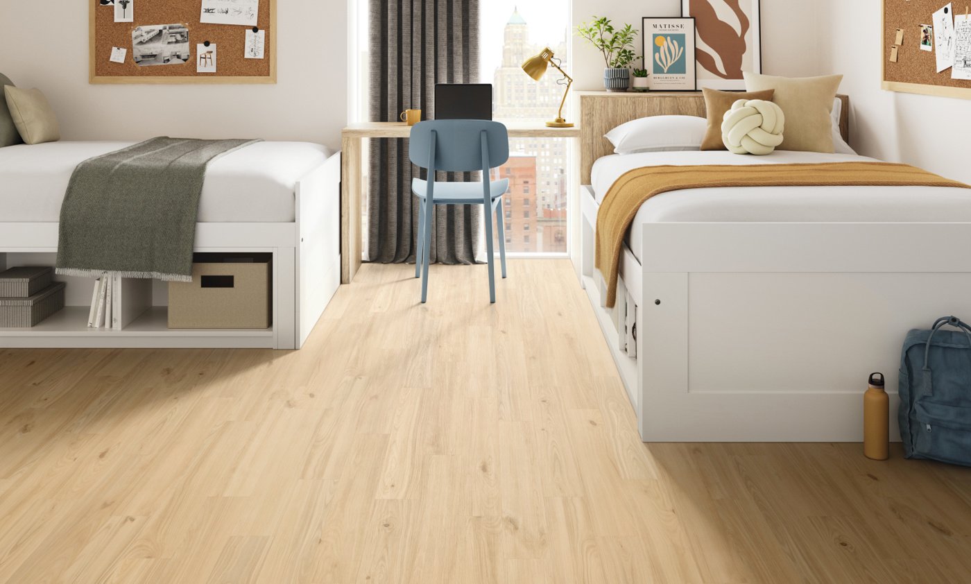 Meadow Cherry wood lvp floors elevate the college dorm, avaiable to be installed as gluedown and rigid core