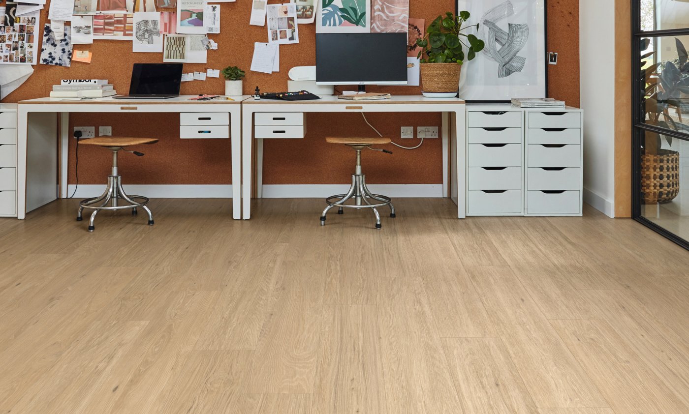 River Hickory rigid core floors in an office; from the Korlok Reserve collection