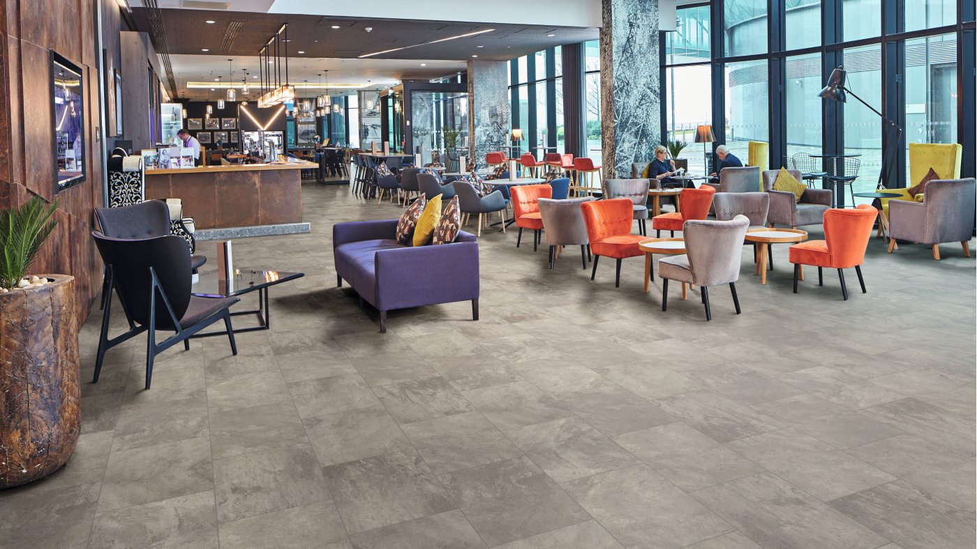 Coastal Fog  RKT3004-G rigid core floors in a hotel lobby