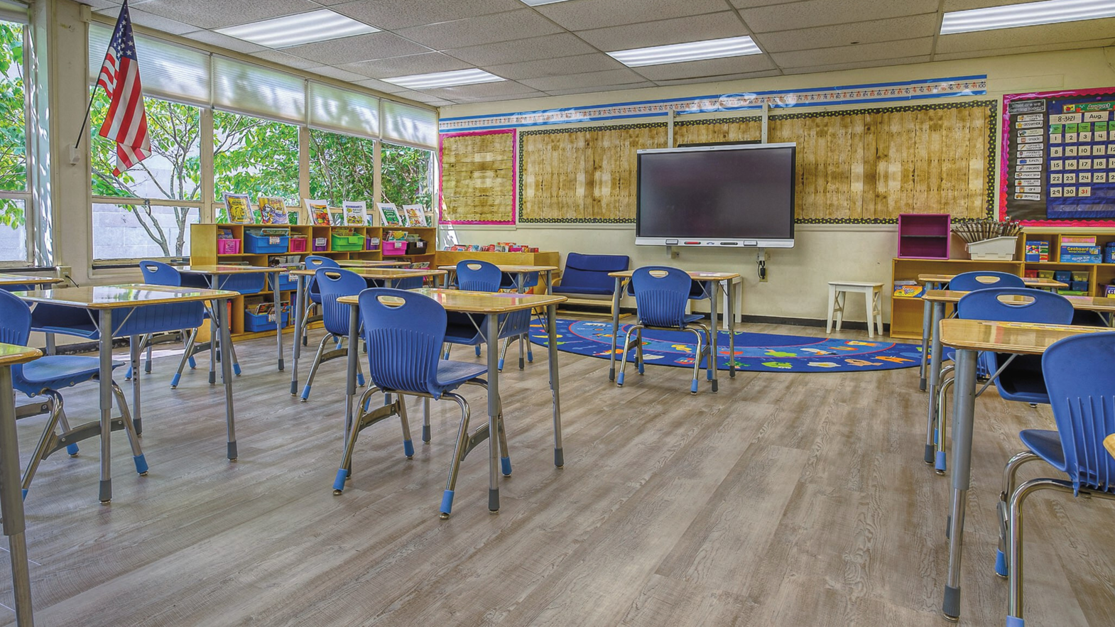 Classroom at St. Edmund's Academy with new Magna WP413 lvt floors from the Opus collection
