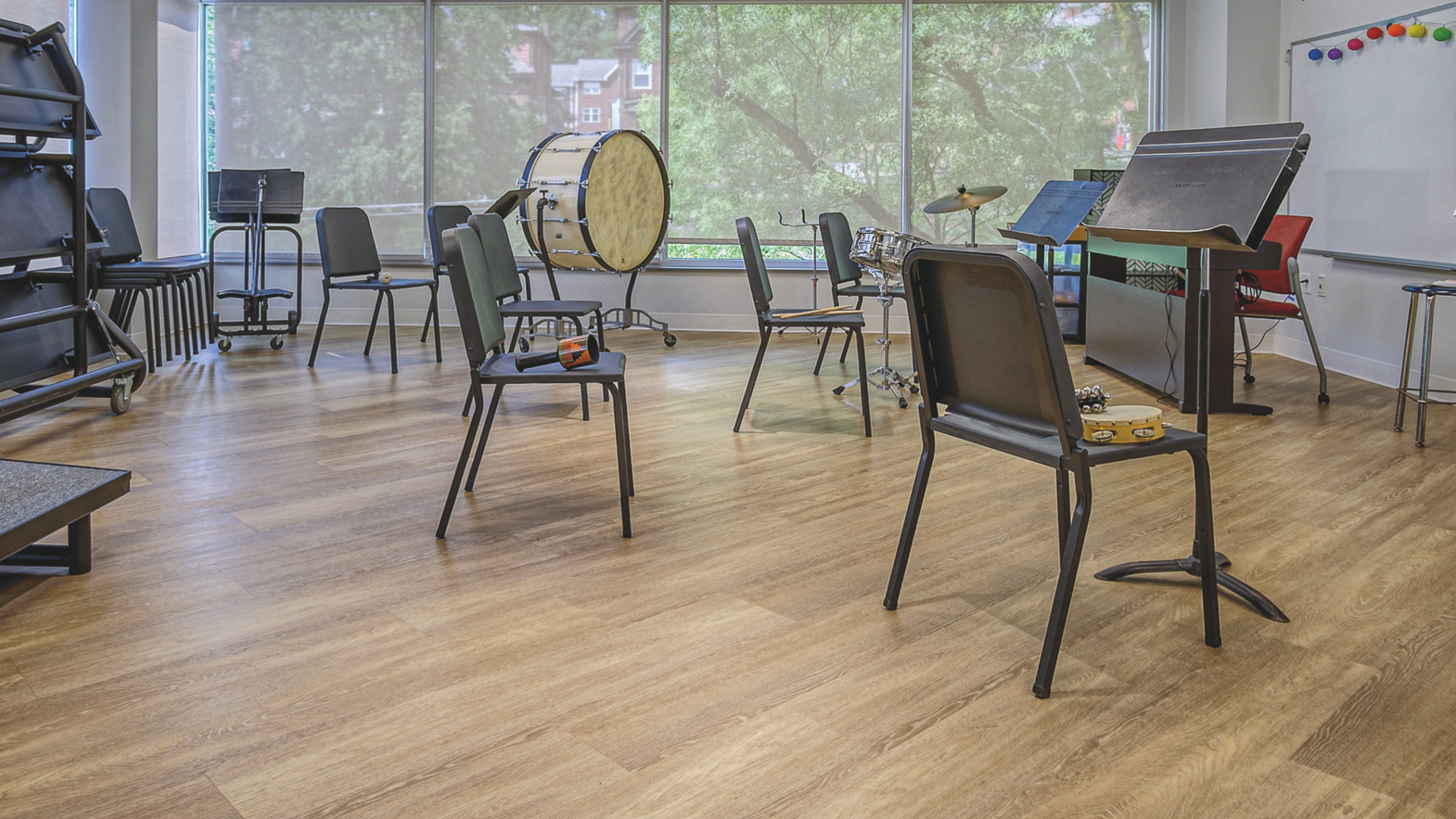 Niveus WP411 lvt floors from the Opus collection in the music room at St. Edmund's Academy