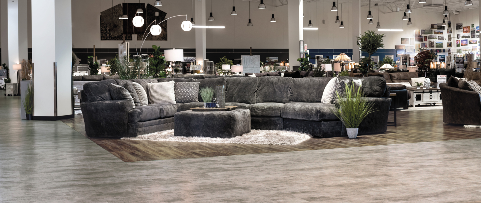 Sectional sofa on Hartford lvp floors is set off from the main pathways marked by Colorado lvt floors