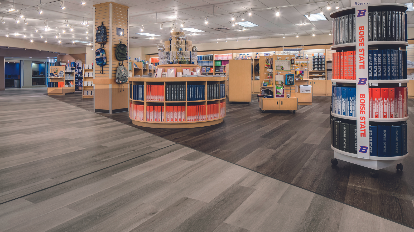 Washed Velvet Ash LVT floors separate the book store section from the Washed Grey Ash lvt foot path