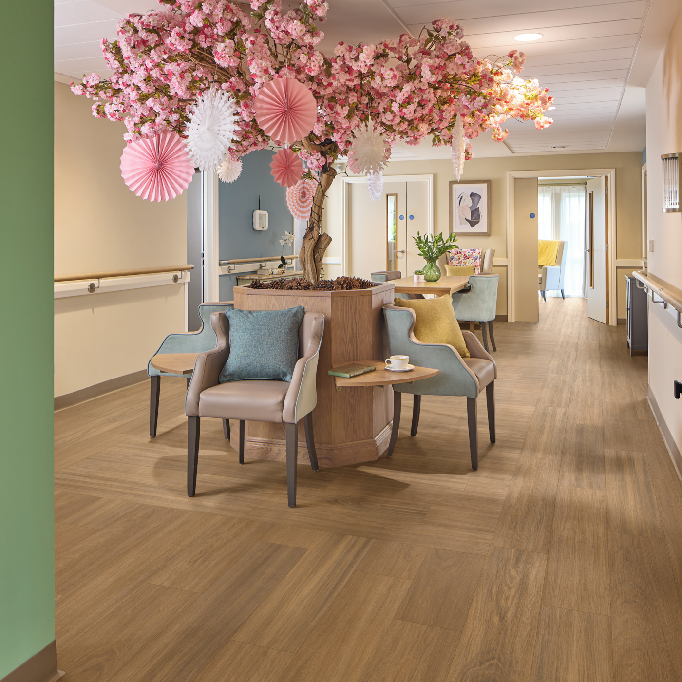 Borolo Oak floors used to zone seating areas in a healthcare waiting room