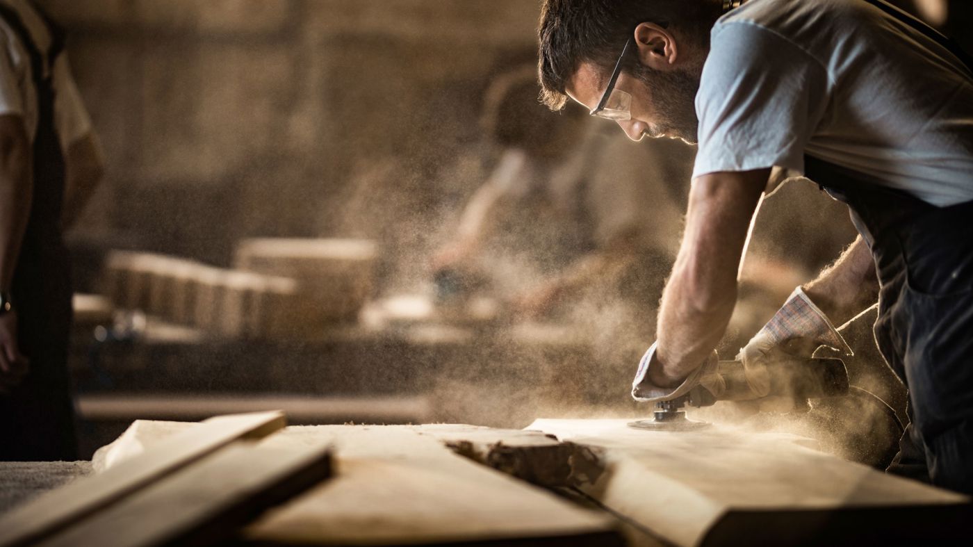 A man creating Karndean floors