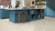 Blue kitchen with Cotton Oak RL38 floors in a herringbone pattern with DS04-3 design strips in between