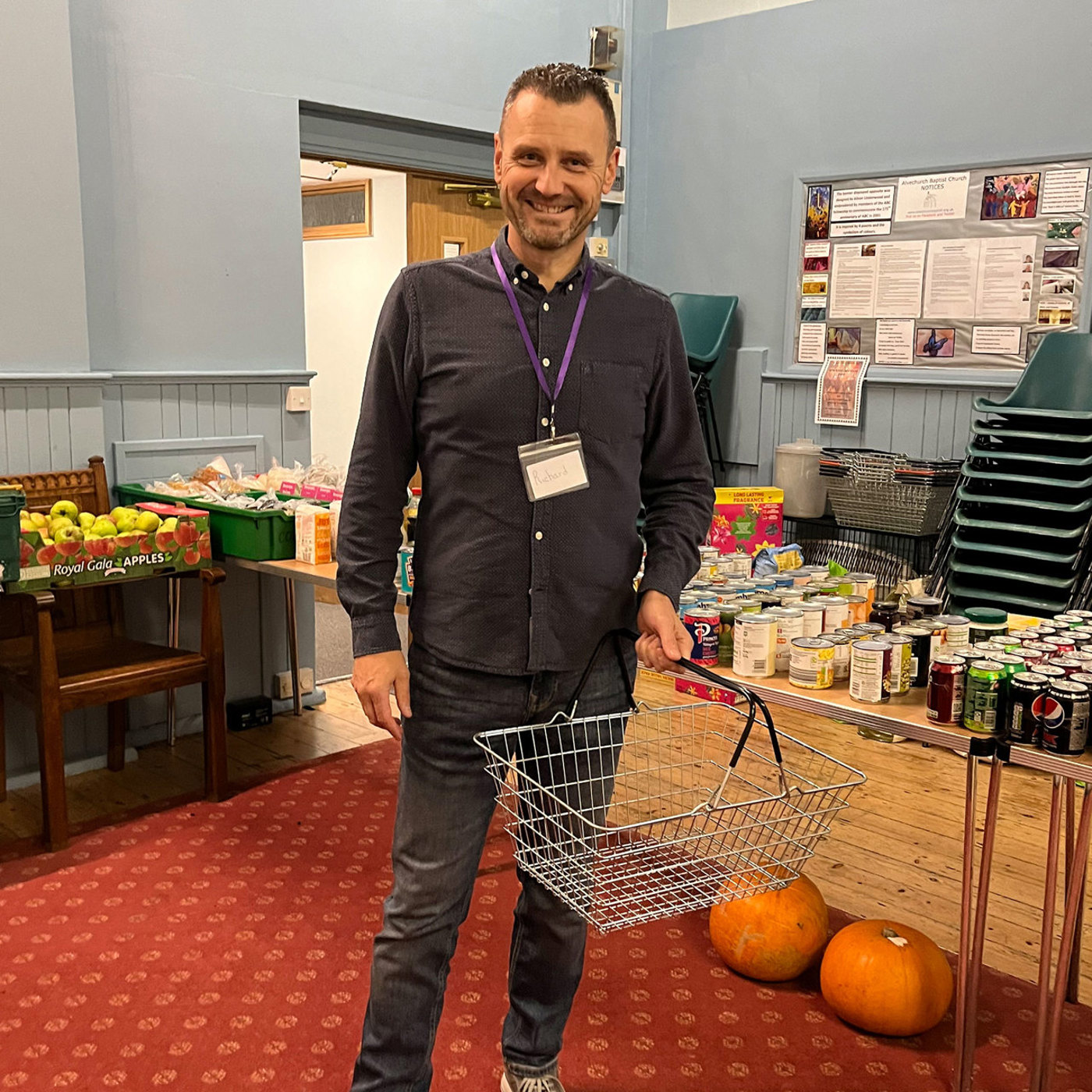 A Karndean Designflooring team member volunteering at a local community grocery