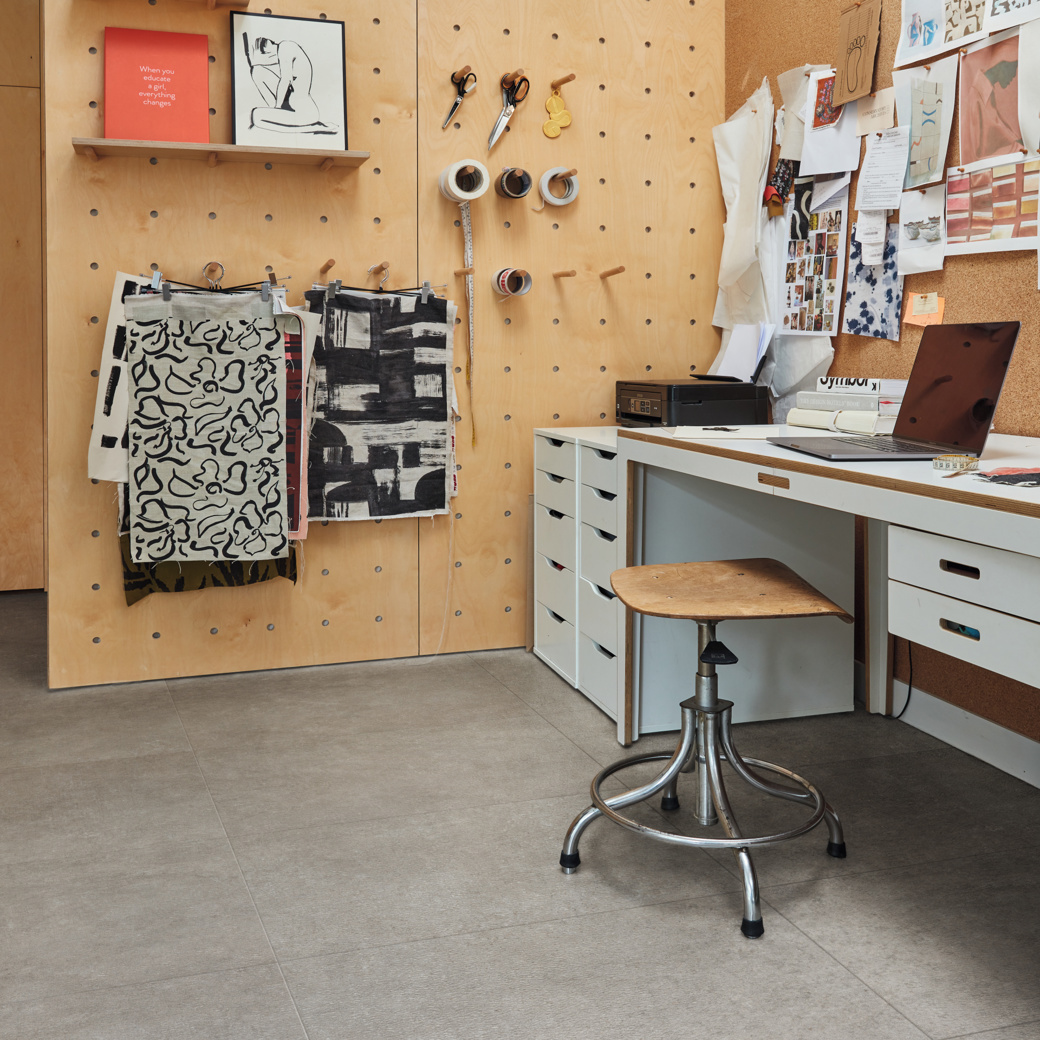 Art Select Cambric Stone dark grey LVT flooring in a home office type environment
