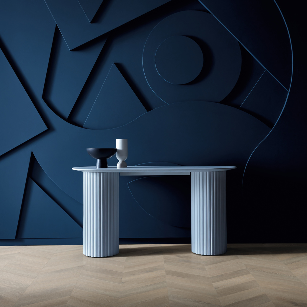 Kensington oak small chevron flooring next to a feature wall