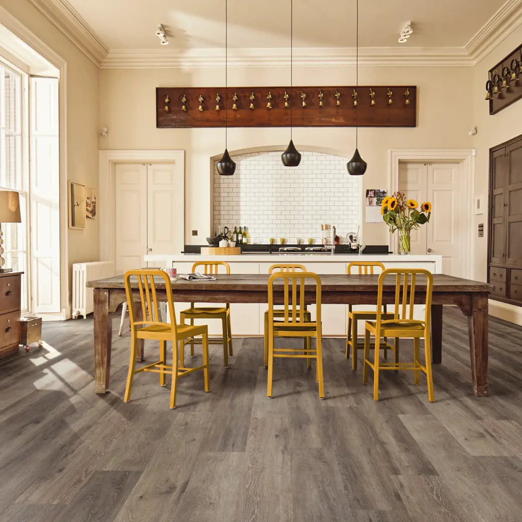 Baltic mistral oak dark grey flooring laid in a kitchen dinner